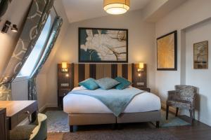 Postel nebo postele na pokoji v ubytování Régence Etoile