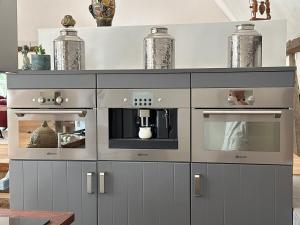 Dapur atau dapur kecil di Onder de lindebomen +40 gambar