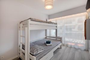 Posteľ alebo postele v izbe v ubytovaní LE SYLVAPLANA JUAN LES PINS Terrasse 30m2