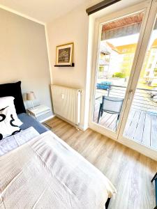 Postel nebo postele na pokoji v ubytování Ferienwohnung Markkleeberg Zentrum