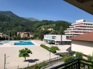 a view of a resort with a swimming pool at Premium Apartment in Fojnica