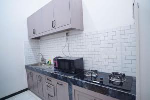 Η κουζίνα ή μικρή κουζίνα στο Casa de Vie Villa