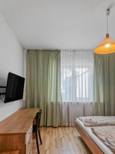 A bed or beds in a room at CityApt Wolfik Stockerau