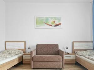 A bed or beds in a room at CityApt Wolfik Stockerau