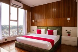 Postel nebo postele na pokoji v ubytování Mhendo Hotel & Studio Suites + 37 fotografií
