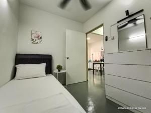 Postel nebo postele na pokoji v ubytování Cozy Homestay#5 single bed#Batu Kawan Penang