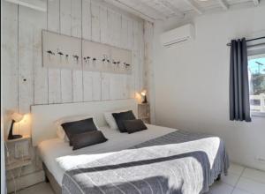 Postel nebo postele na pokoji v ubytování LES MAISONS DU PATY + 81 fotografií