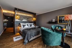 Postel nebo postele na pokoji v ubytování SOLEA SÜDTIROL Boutique Hotel