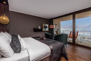 Postel nebo postele na pokoji v ubytování SOLEA SÜDTIROL Boutique Hotel + 37 fotografií