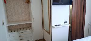 TV a/nebo společenská místnost v ubytování Hotel B&B Fortuna