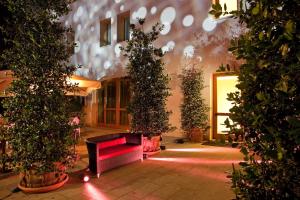 Vonkajšia záhrada v ubytovaní Al Tezzon Hotel