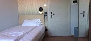 Postel nebo postele na pokoji v ubytování Hotel B&B Fortuna