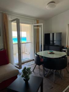 Televisor o centre d'entreteniment de Apartmani Sirius