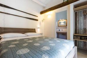 Postel nebo postele na pokoji v ubytování Le Nereidi B&B + 5 fotografií