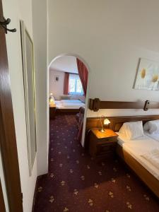 Voodi või voodid majutusasutuse Pension Plattenhof toas