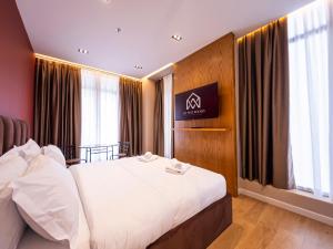 Voodi või voodid majutusasutuse My Way Rooms toas