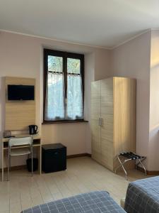 TV a/nebo společenská místnost v ubytování Casa Giardinetto