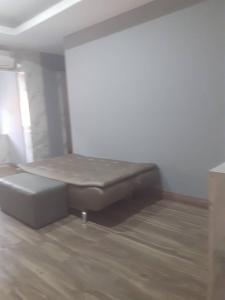 Ένα ή περισσότερα κρεβάτια σε δωμάτιο στο ChoChun Apartment
