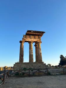 a large monument with a blue sky in the background at La dimora degli scrittori in Porto Empedocle +41 photos