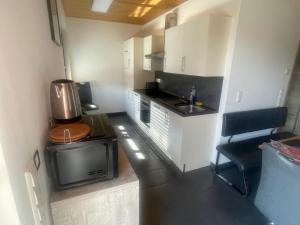 Η κουζίνα ή μικρή κουζίνα στο Haus Mone