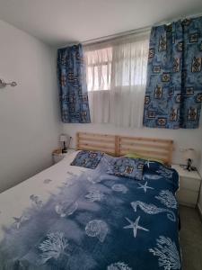 Ένα ή περισσότερα κρεβάτια σε δωμάτιο στο Callao Salvaje