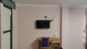 TV a/nebo společenská místnost v ubytování Hotel Tri-Star Regency + 30 fotografií