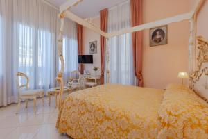 Posteľ alebo postele v izbe v ubytovaní Hotel Marte
