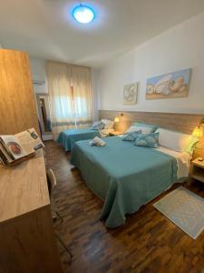 Postel nebo postele na pokoji v ubytování Hotel Citti