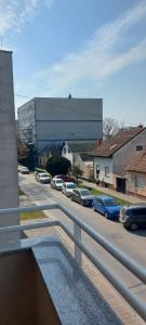 a view of a parking lot with cars parked at Anja&Nika in Osijek