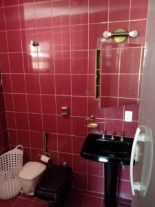 Koupelna v ubytování Apartamento no coração da cidade + 10 fotografií