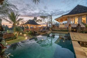 Bazén v ubytování Uma Caming Villa Ubud nebo v jeho okolí