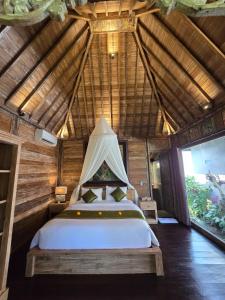 Postel nebo postele na pokoji v ubytování Aura Guesthouse