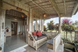 Balkón nebo terasa v ubytování Uma Caming Villa Ubud