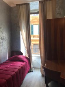 Postel nebo postele na pokoji v ubytování Sandel Giubileo Hotel + 37 fotografií