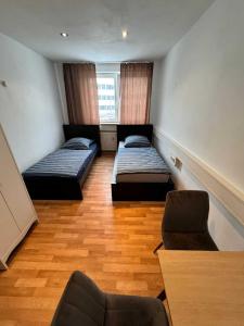 Postel nebo postele na pokoji v ubytování Apartments Haar