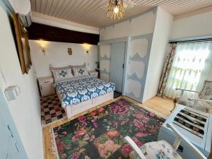 A bed or beds in a room at Mystic Konak