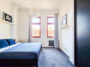 Posteľ alebo postele v izbe v ubytovaní AS HOME Apartamenty - Grand Designer Loft 90m2 RYNEK 505