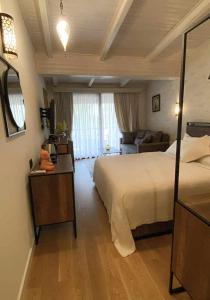 Postel nebo postele na pokoji v ubytování Le prince Rooms