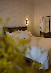 Postel nebo postele na pokoji v ubytování Le prince Rooms