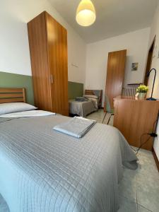 Postel nebo postele na pokoji v ubytování Da Filippo B&B