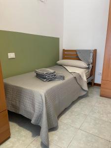 Postel nebo postele na pokoji v ubytování Da Filippo B&B