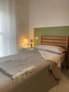 Postel nebo postele na pokoji v ubytování Da Filippo B&B