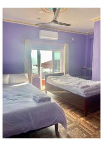 Llit o llits en una habitació de Red Tiger Resort