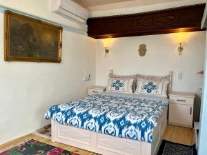 A bed or beds in a room at Mystic Konak