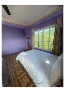 Llit o llits en una habitació de Red Tiger Resort