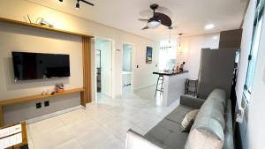 Μια τηλεόραση ή/και κέντρο ψυχαγωγίας στο Residencial Bianca, Ap 15 - 1ºAndar
