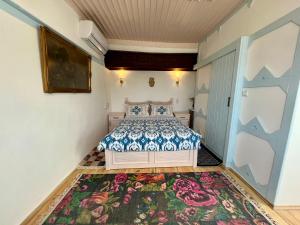 A bed or beds in a room at Mystic Konak