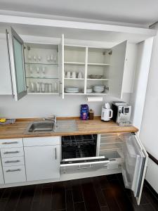 Kuchyň nebo kuchyňský kout v ubytování "Cooles Ferienhaus!" - im Coburger Wonderland - Ihr Zuhause auf Zeit!