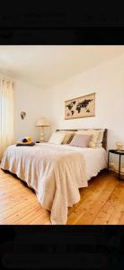 Ένα ή περισσότερα κρεβάτια σε δωμάτιο στο Appartement de charme proche de Colmar