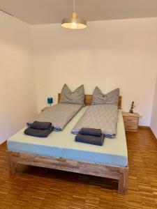 Postel nebo postele na pokoji v ubytování "Cooles Ferienhaus!" - im Coburger Wonderland - Ihr Zuhause auf Zeit!